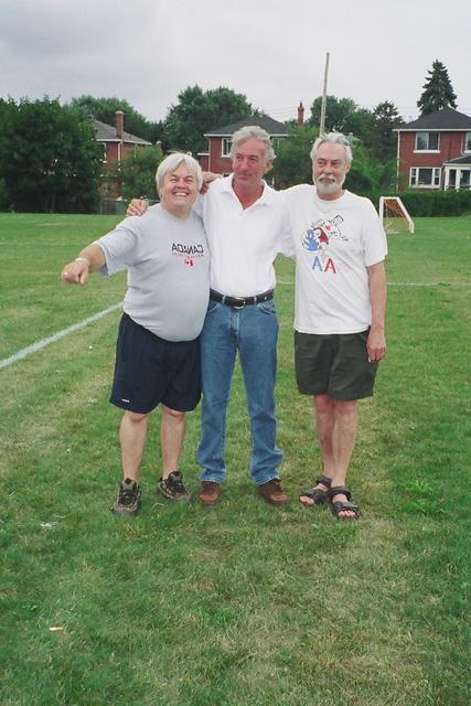 Holding each other up are Wayne Stone, John Anderson, Paul Rouleau