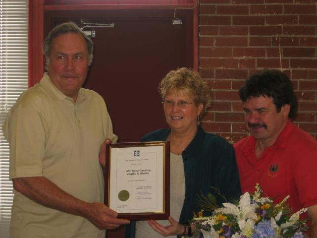 Sandi & Neil with Downtown Board person