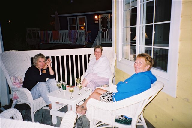 Peggie, Cathy, Linda nightcapping on the porch